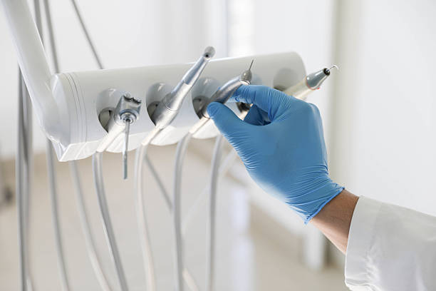 Professional Tooth Extraction technician working in Melville, NY